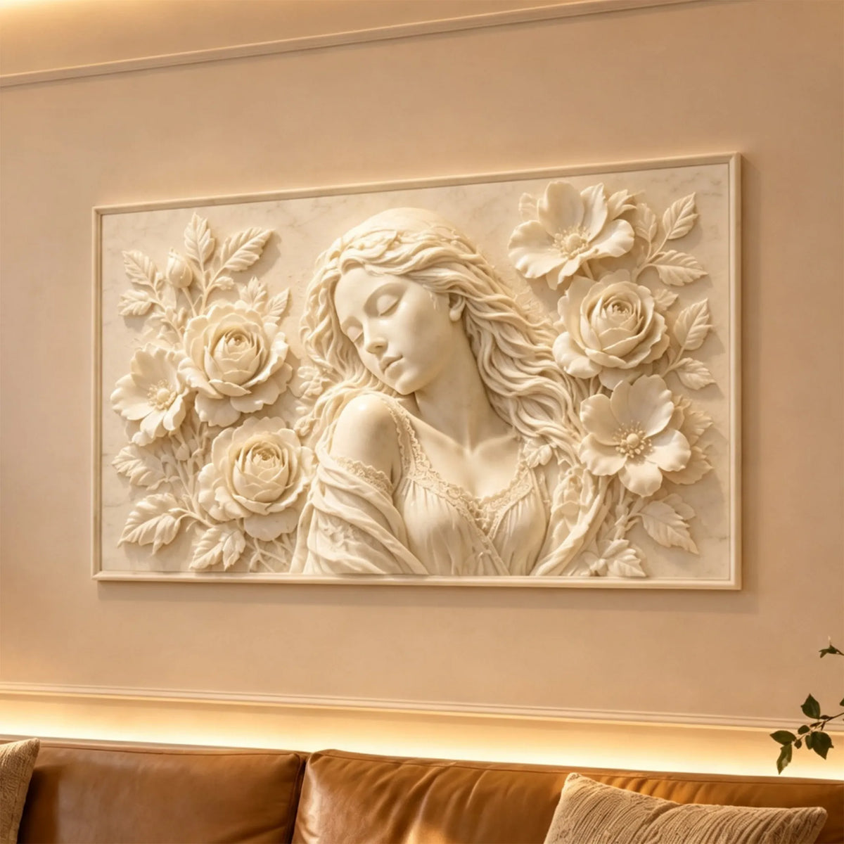 White marble wall relief sculpture of a woman with roses hangs above leather sofa on warm interior wall.