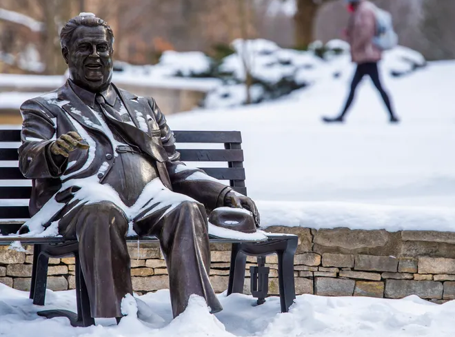 stainless steel sculpture in the snow weather