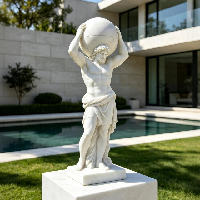 A marble atlas mythology statue stands on a stone pedestal beside a swimming pool.