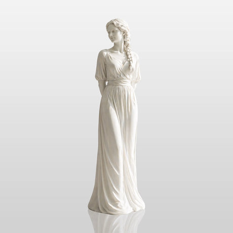 A white marble female statue stands gracefully in an elegant classical interior with warm curved details.