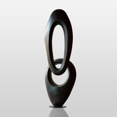 Flowing oval-shaped bronze sculpture with black finish
