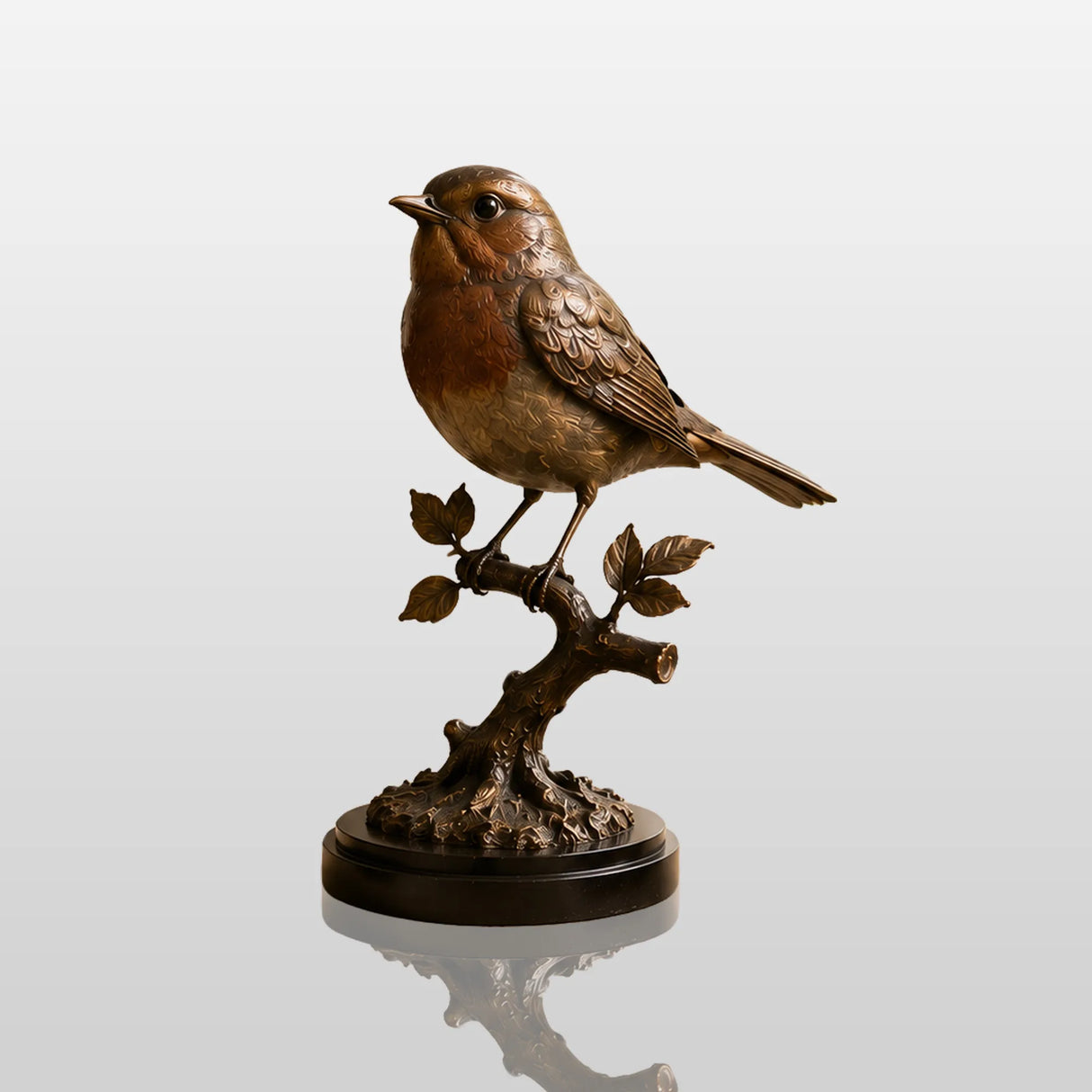 Bronze robin bird table sculpture sits on the black marble table beside stacked hardcover books.