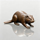 Bronze beaver statue crouches on wet rocks beside a flowing forest stream in a garden.