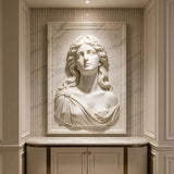 Laurel lady marble wall sculpture is embedded on fluted panel wall in a refined luxury interior space.