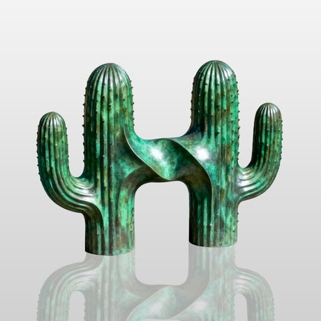 A stylized cactus sculpture made of bronze with a vibrant green patina finish, combining natural desert inspiration with artistic curves, perfect for outdoor spaces like gardens or pool areas.