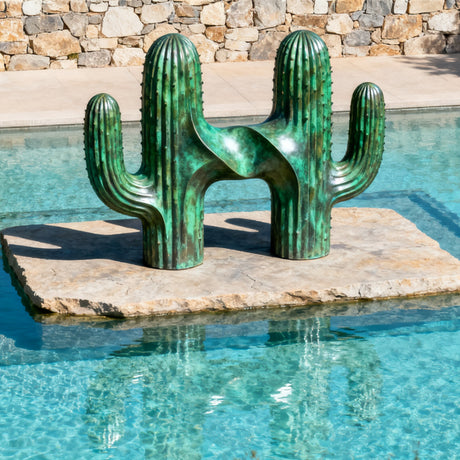 A stylized cactus sculpture made of bronze with a vibrant green patina finish, combining natural desert inspiration with artistic curves, perfect for outdoor spaces like gardens or pool areas.
