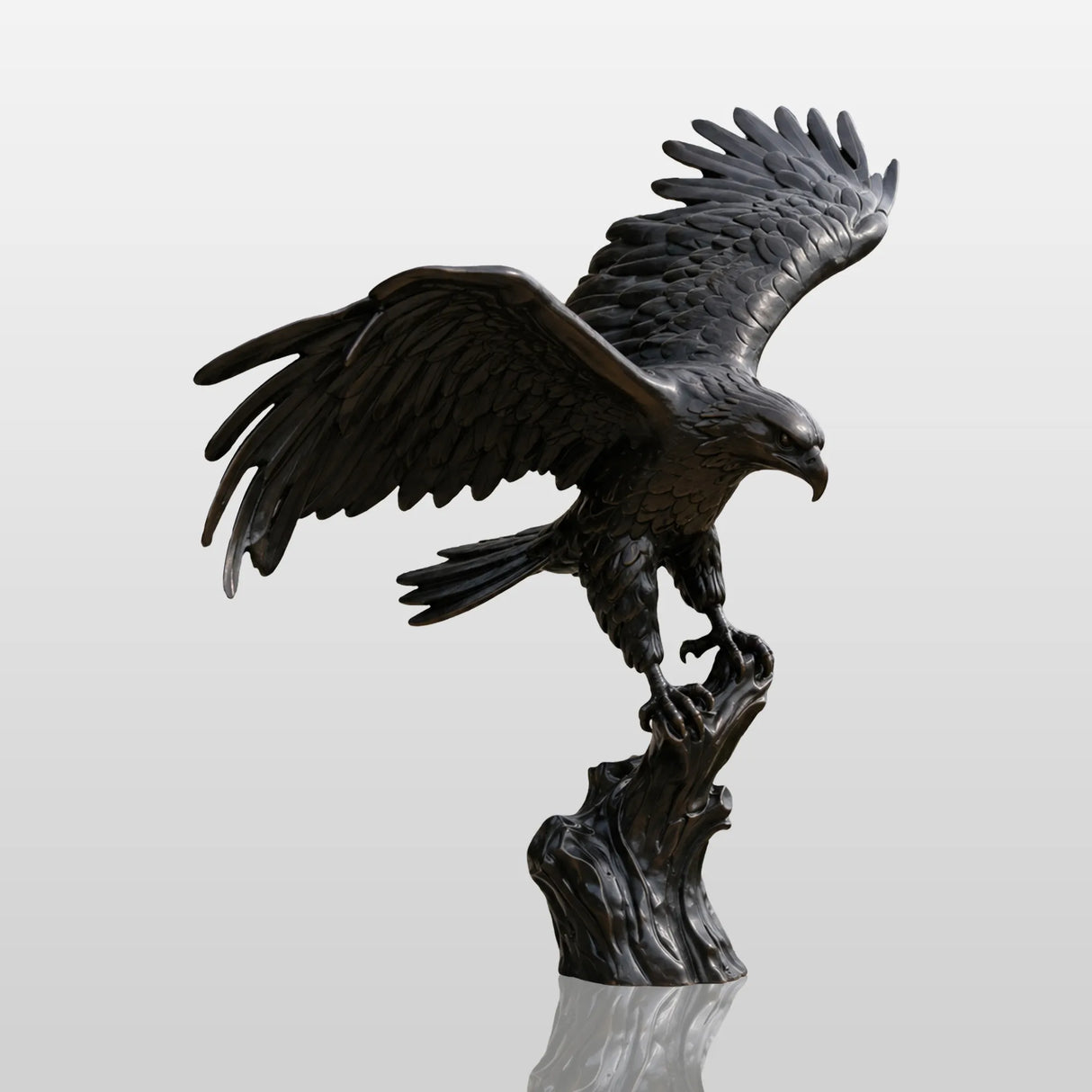 Dark bronze eagle statue perches on a stone pedestal near a home entrance.
