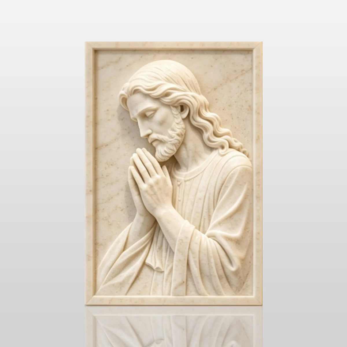 Marble relief of praying Jesus hangs on the wall in bright home interior.