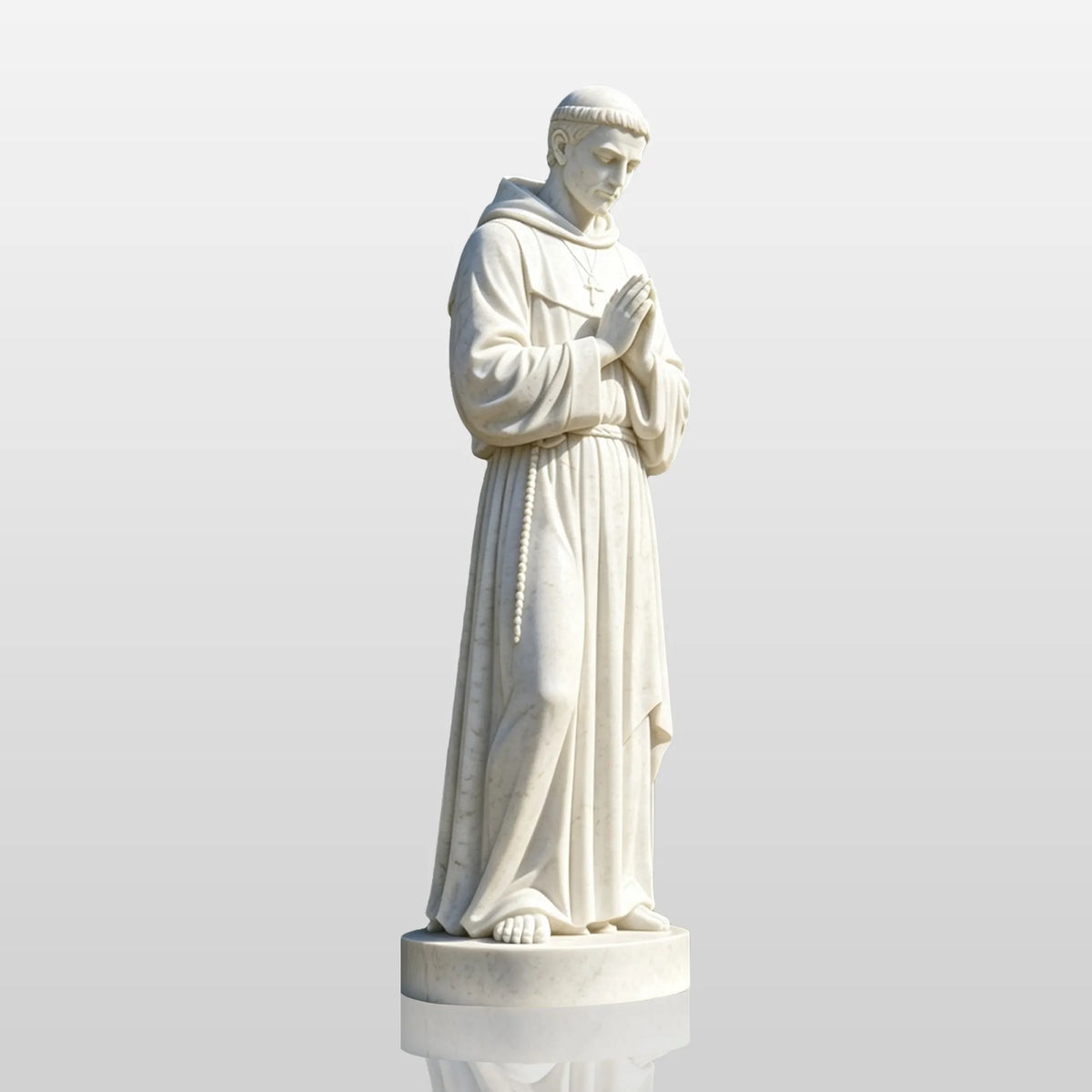 A Saint Francis of Assisi statue in white marble stands on the base beside a house.