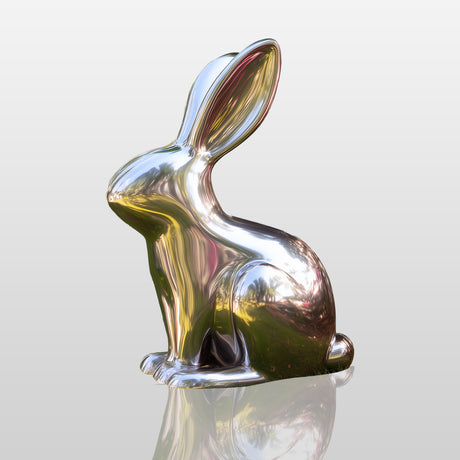 Polished stainless steel rabbit sculpture with mirror surface for modern garden or outdoor art display.