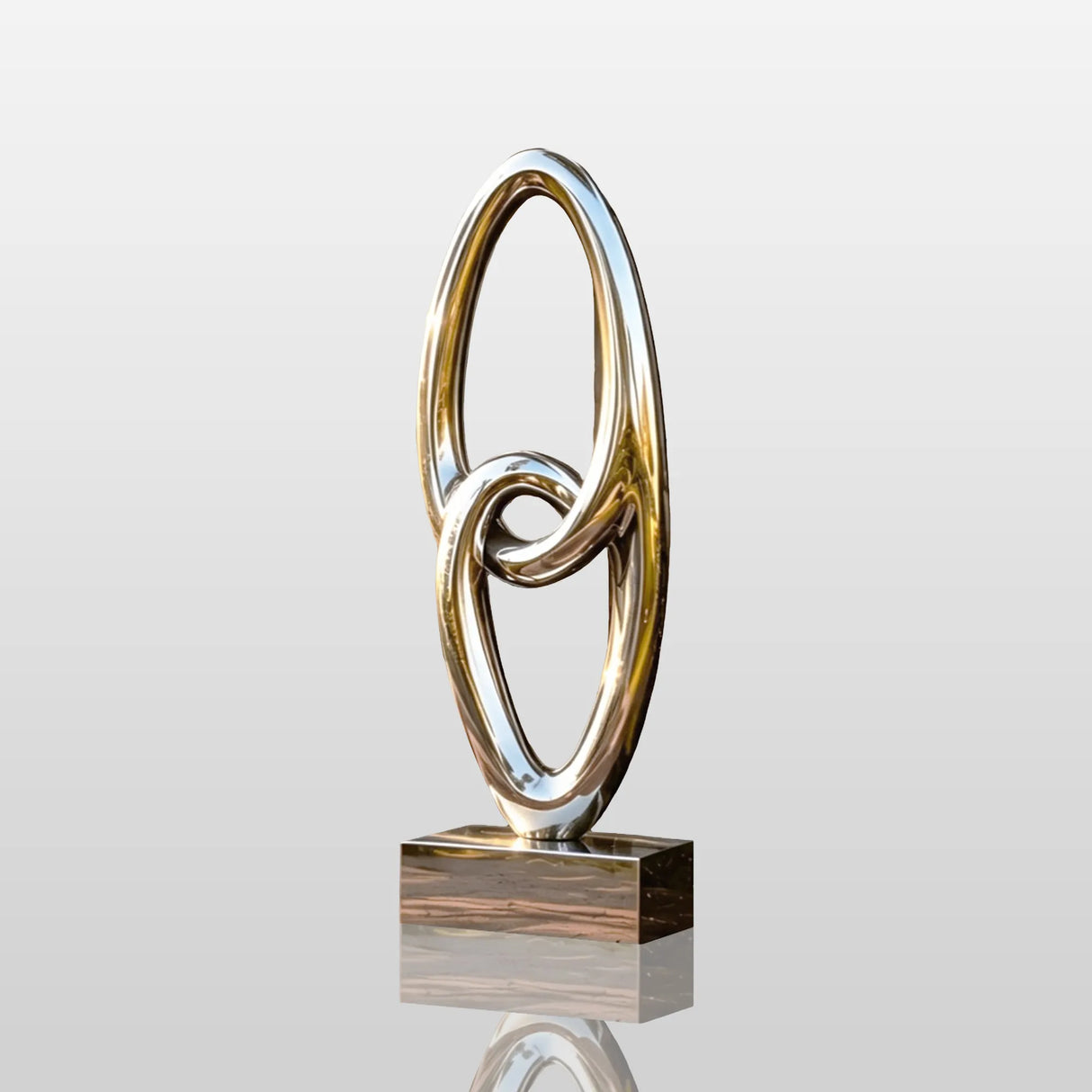 Reflective interlocked ring stainless steel sculpture stands on the residential front porch.