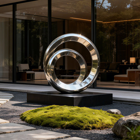 Stainless steel sculpture with polished mirror finish and ring design, suitable for luxury villas, gardens, and courtyards.