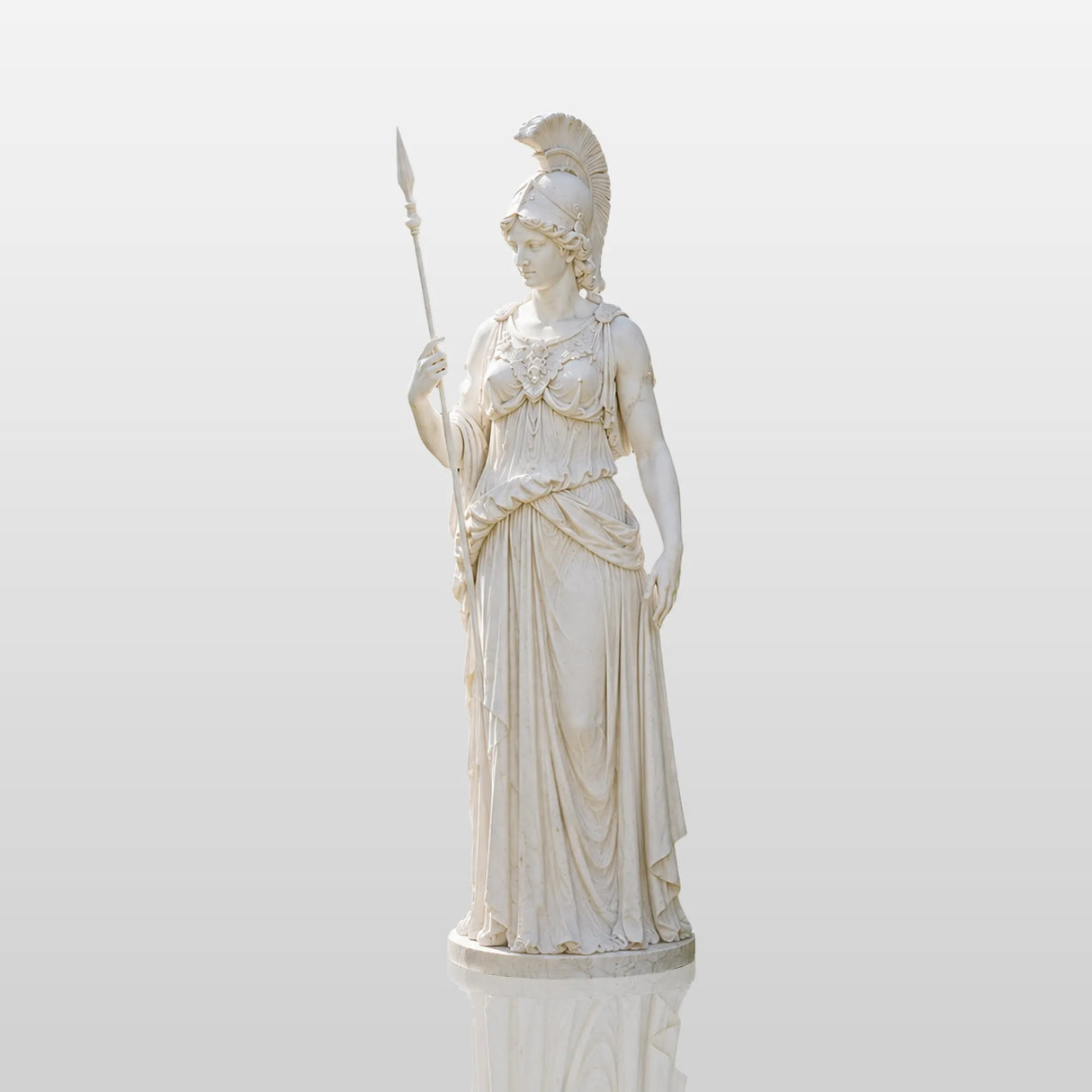 White marble Athena statue stands on a pedestal amid the garden plantings.