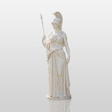 White marble Athena statue stands on a pedestal amid the garden plantings.