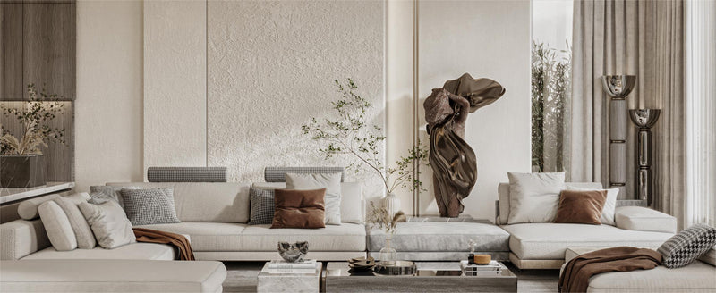 A contemporary sculpture with abstract forms is displayed in a stylish living room.